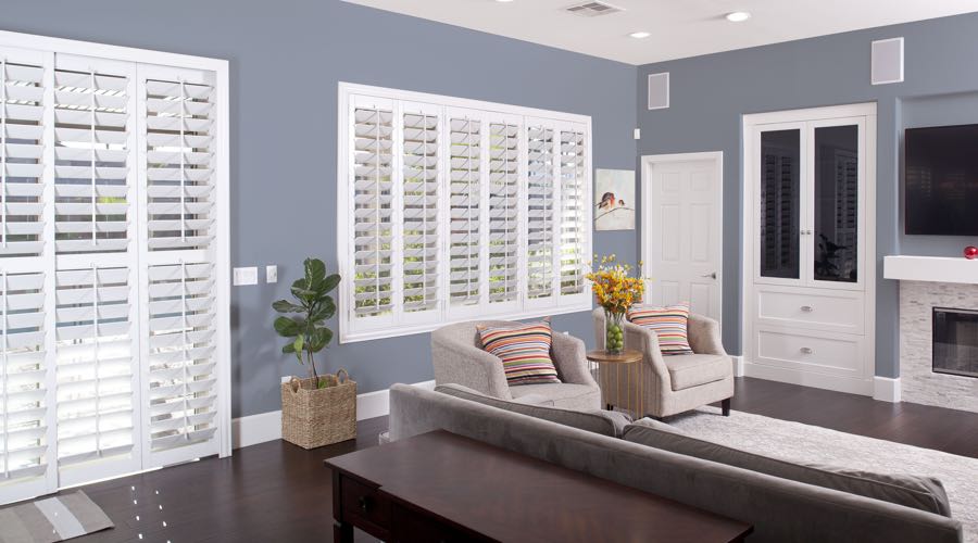 Faux Wood Shutters In pretty New York City Living Room